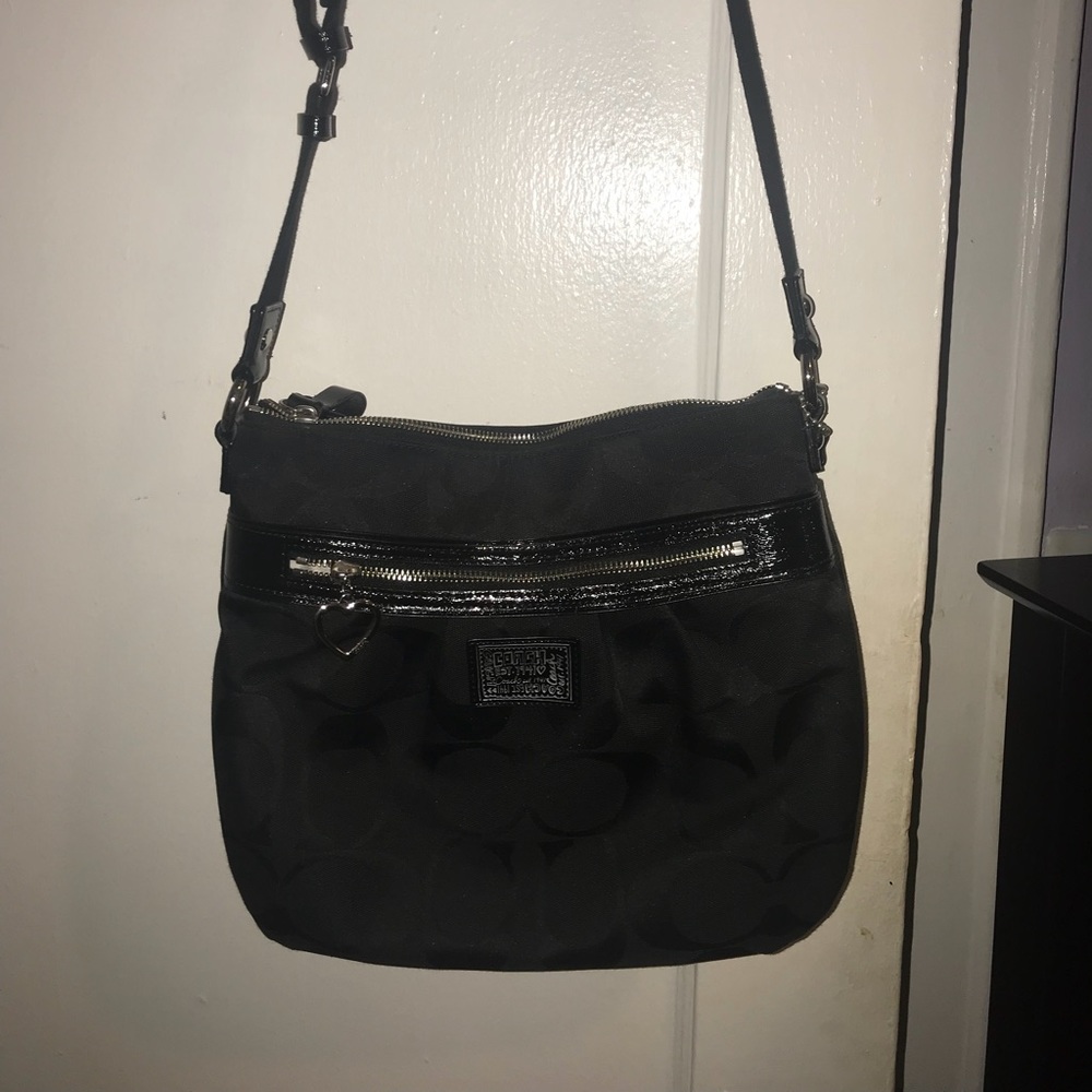 Black fabric Coach crossbody bag